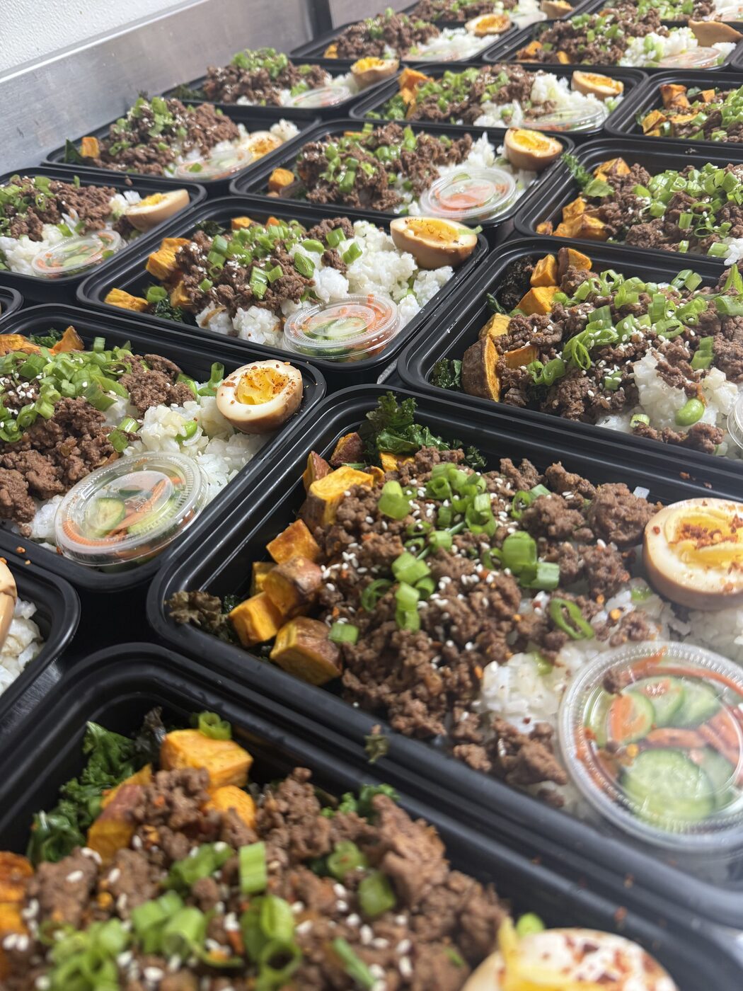 Korean beef rice bowls with soy egg, sweet potato and scallions